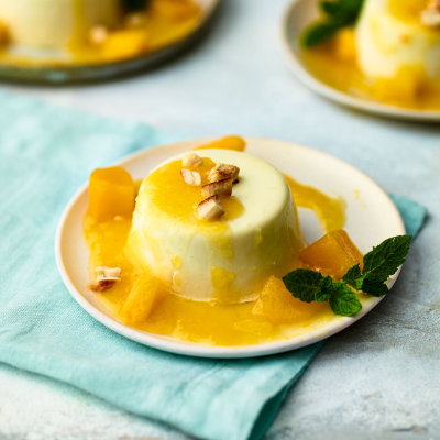 Coconut panna cotta with spicy mango coulis